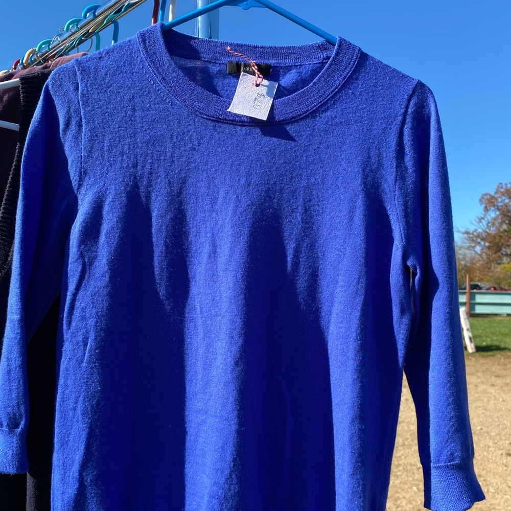 Sea blue J Crew sweater.